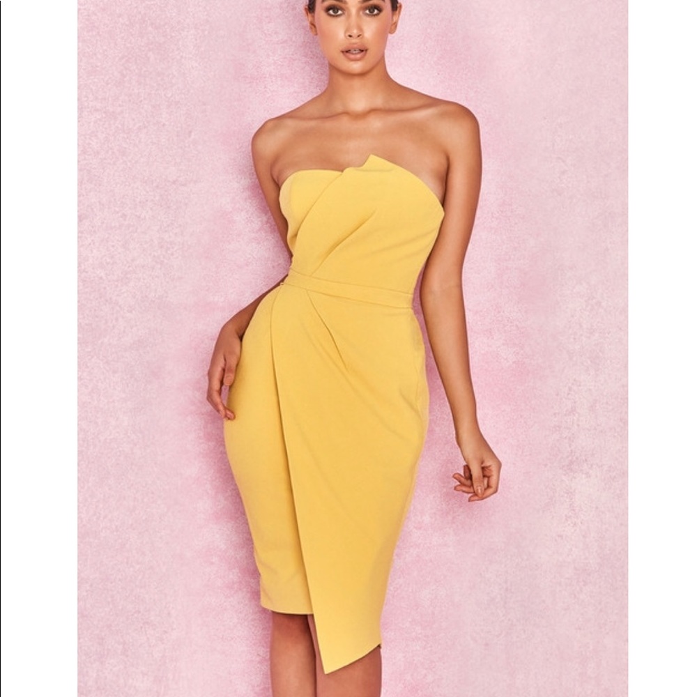 House if CB Uma Dress.  Spring time yellow never worn comes with original box